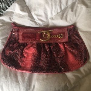 Express pink clutch with gold hardware